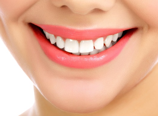 Young smiling woman, white background, copyspace